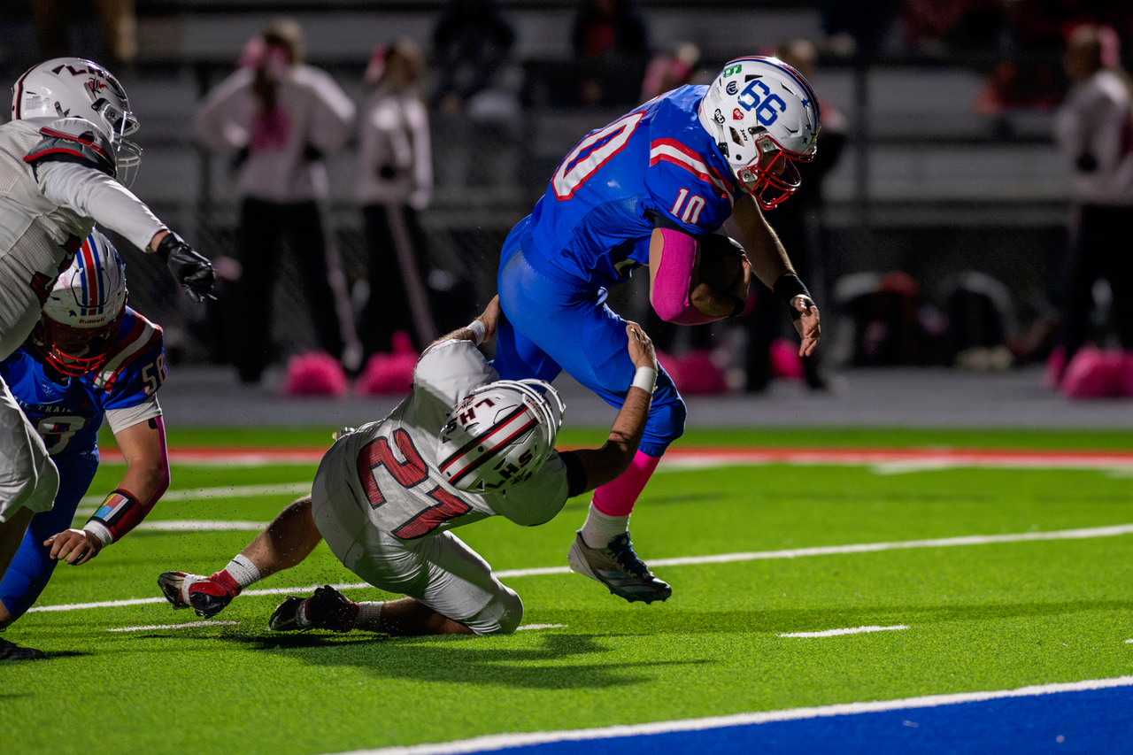 Roop there it is! Senior running back scores five times in Trail win over Liberty