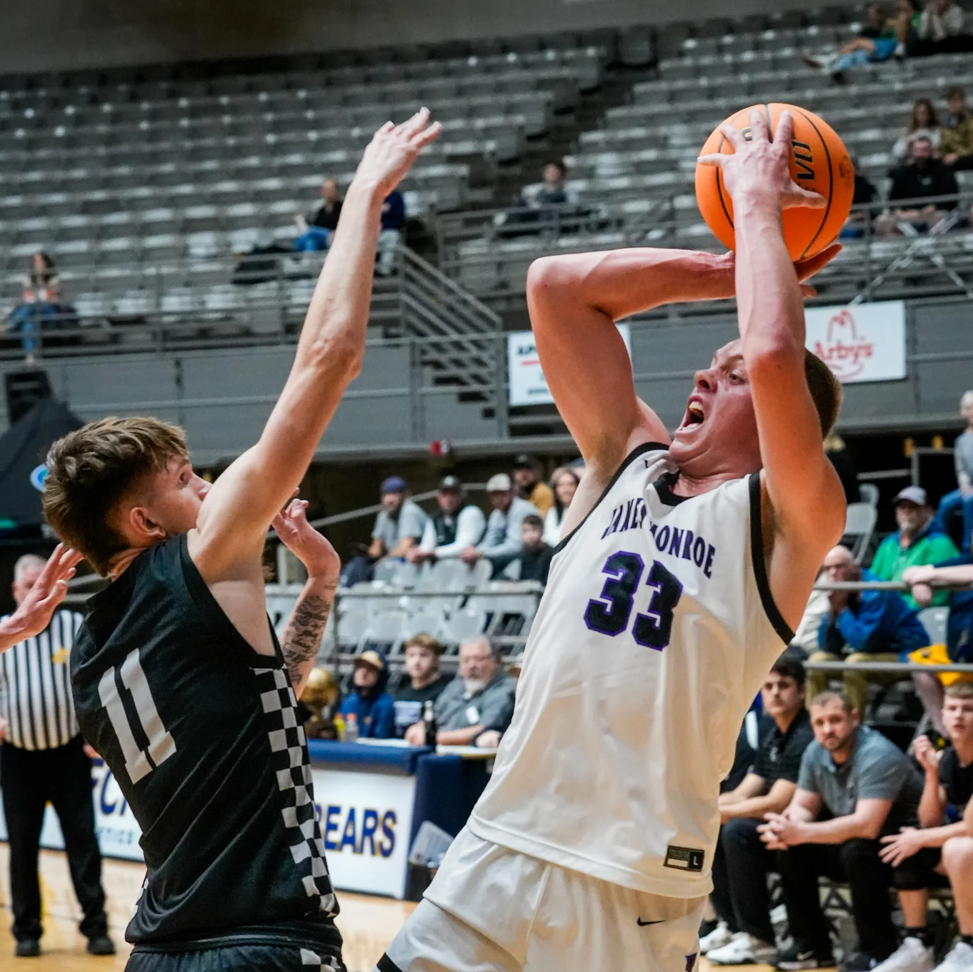 Prep Basketball: Gardinier’s return helps James Monroe rally past Westside